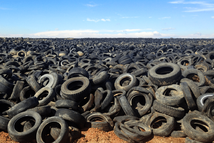 Scrap tires in a field