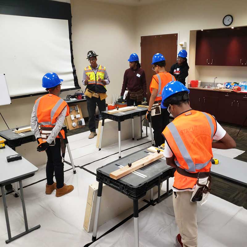 Power Construction's Eugene Green teaches construction trades to high school kids.