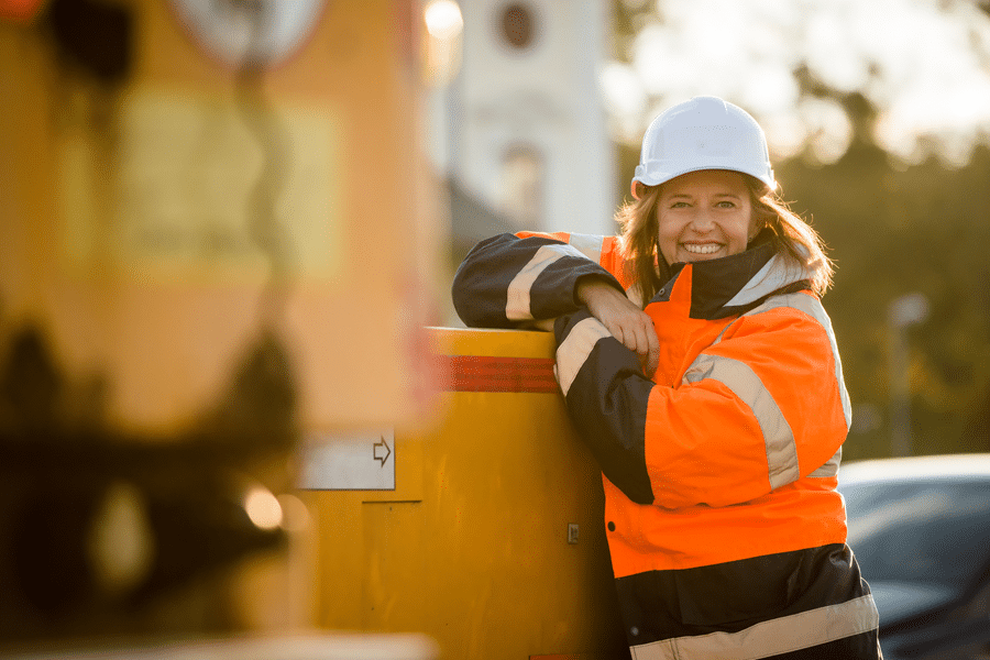 Female construction worker smiling