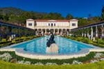 Reflecting pool and fire-resistant architecture at the Getty Center in Los Angeles, showcasing landscape design and campus planning that helped protect the site during historic wildfires.