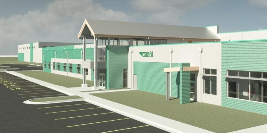 Architectural rendering of Camfil’s new flagship air filtration manufacturing facility in Texas, showcasing resilient design features, modern facade, and expanded parking space under a partly cloudy sky.