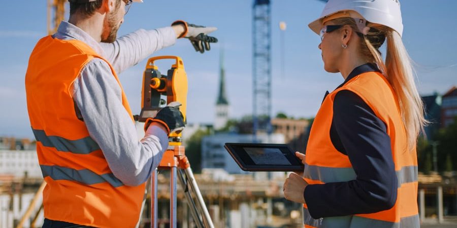 Surveyors on construction site