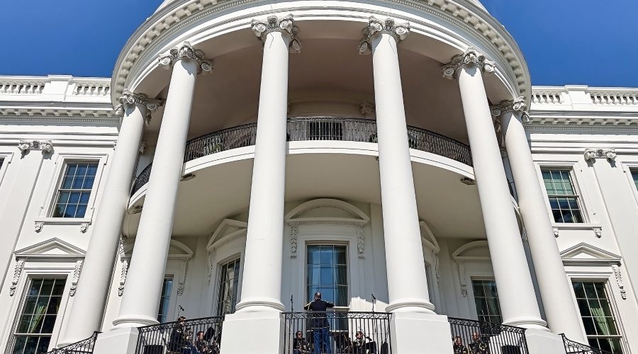 The White House South Portico on a sunny day, symbolizing U.S. federal leadership—relevant to discussions on modernizing permitting processes using AEC-specific digital tools.